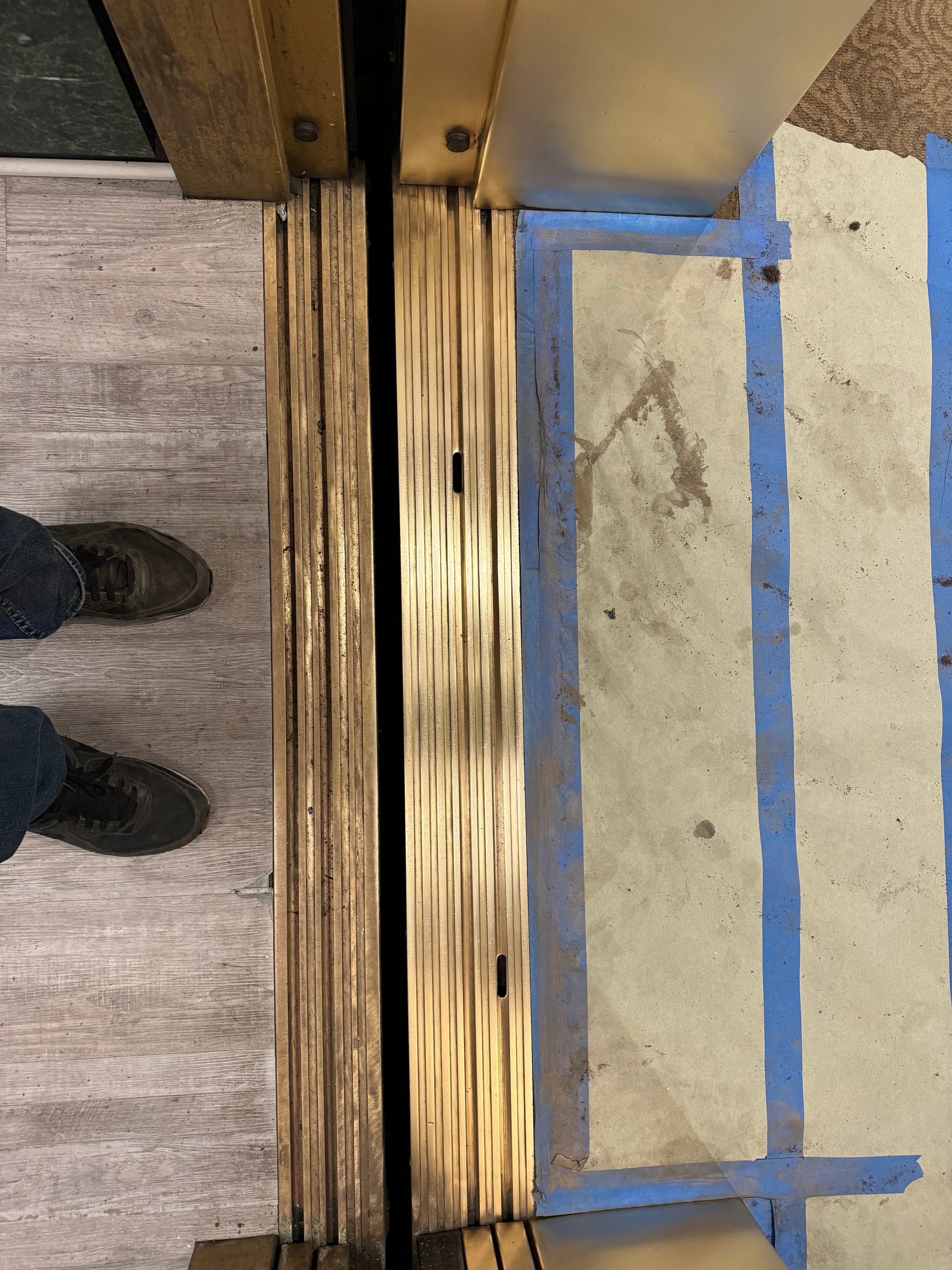 Brass elevator threshold and sill restoration detail