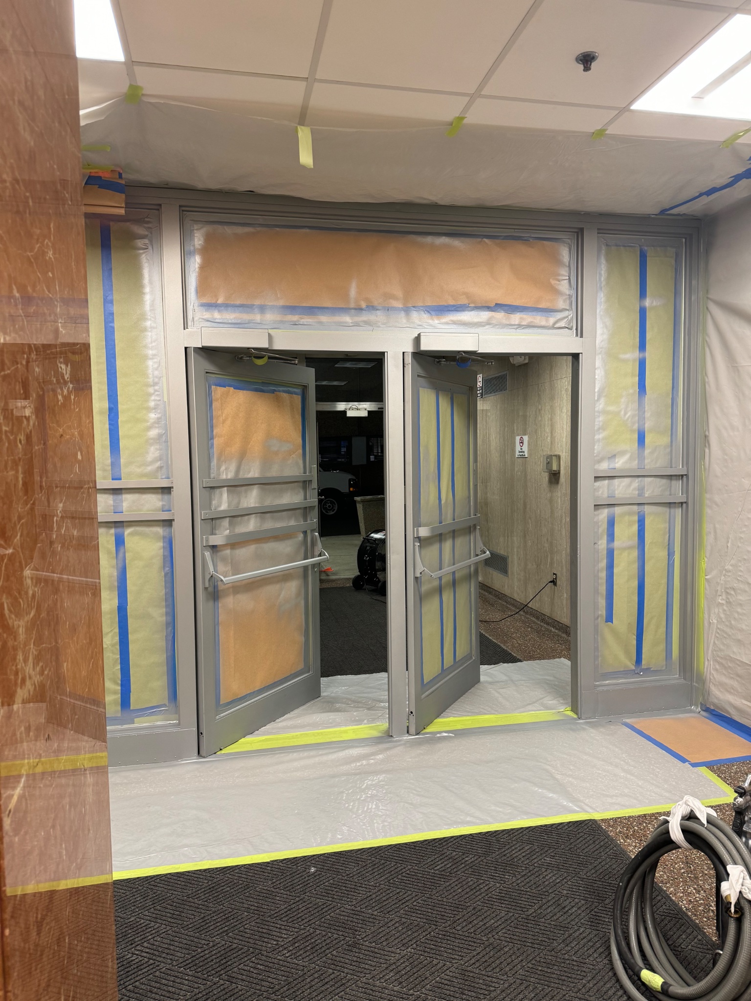 Commercial aluminum doors — during refinishing