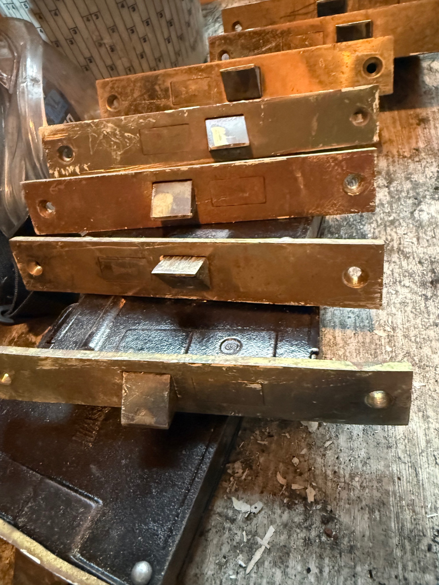 Brass lock plates — before restoration