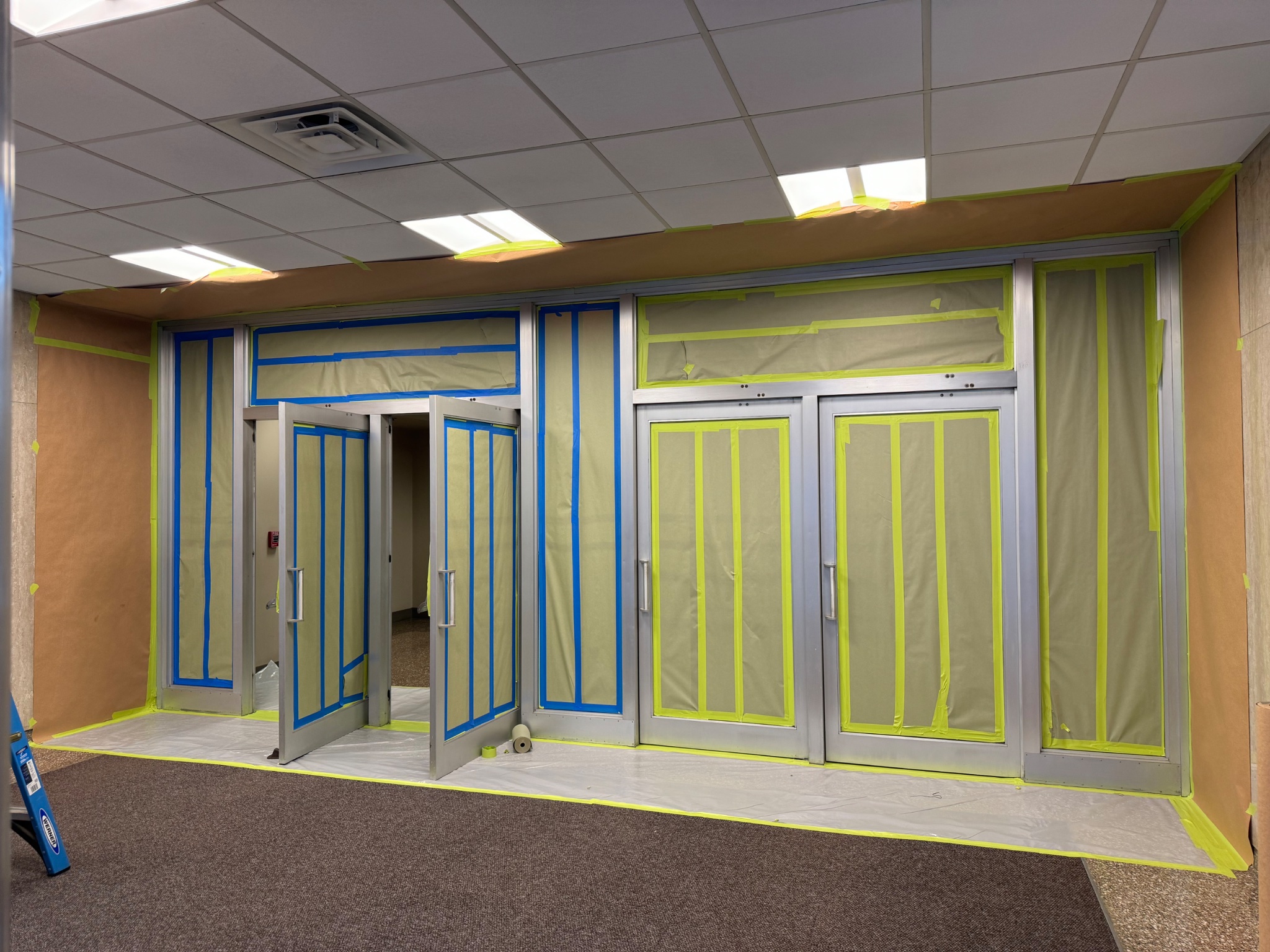 Commercial storefront doors — during refinishing