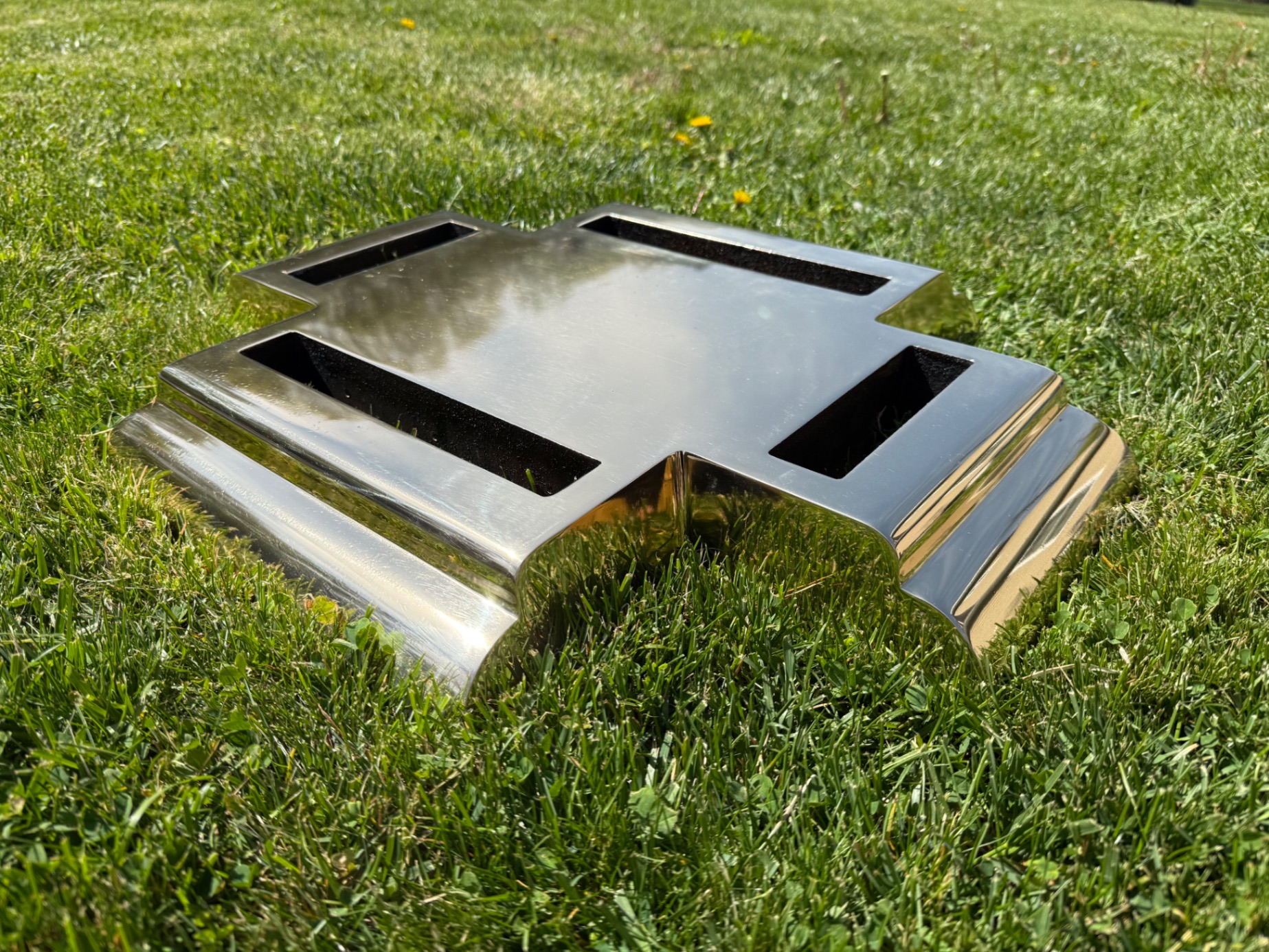 Stainless steel decorative piece — mirror polish after restoration